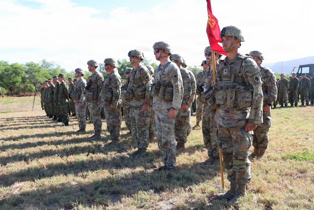 U.S. and Japanese forces stand together during RIMPAC 2026 opening ceremony