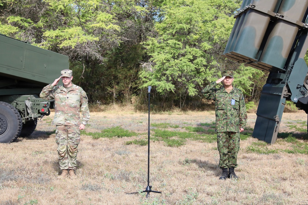 U.S. and Japanese commanding officers salute during RIMPAC 2026