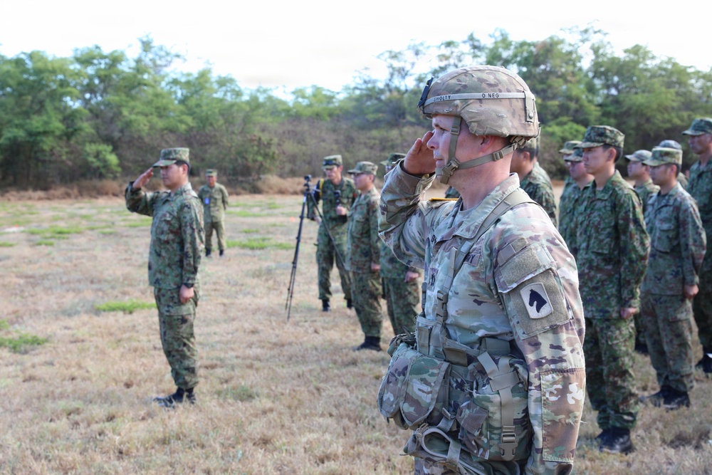 U.S. and Japanese forces stand together during RIMPAC 2026 opening ceremony