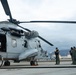 U.S. Marines, Peruvian Navy service members refuel SH-3 Sea King helicopter