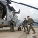 U.S. Marines, Peruvian Navy service members refuel SH-3 Sea King helicopter