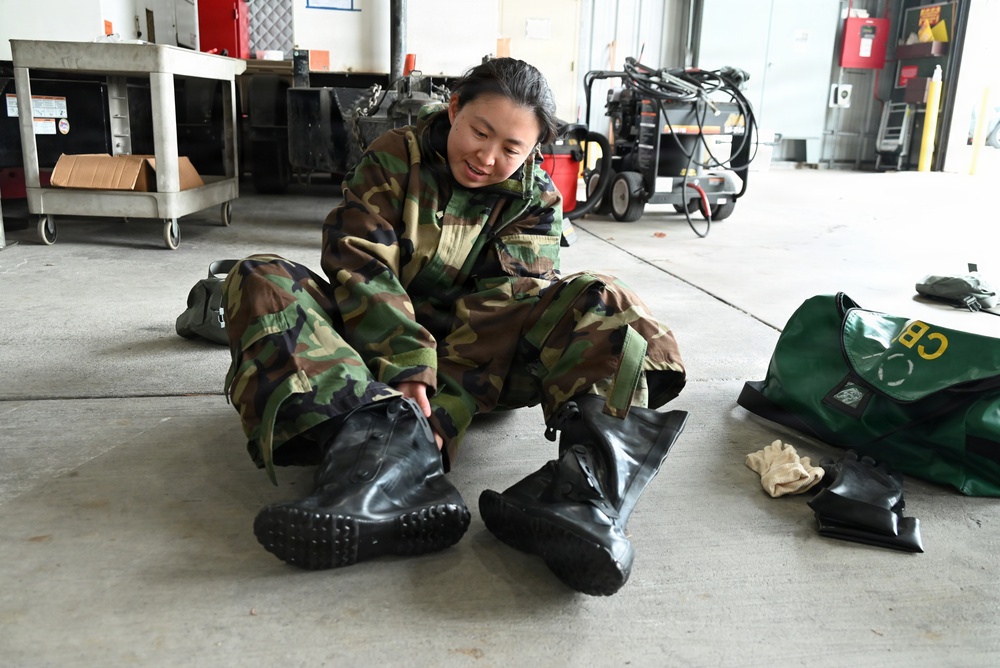 Navy and Coast Guard members train with CBRNE suits