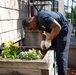 USS Arlington Sailor Plants Flowers at Sail250 Boston COMREL