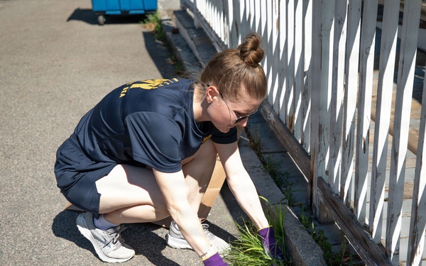 USS Arlington Sailor Pulls Weeds at Sail250 Boston COMREL
