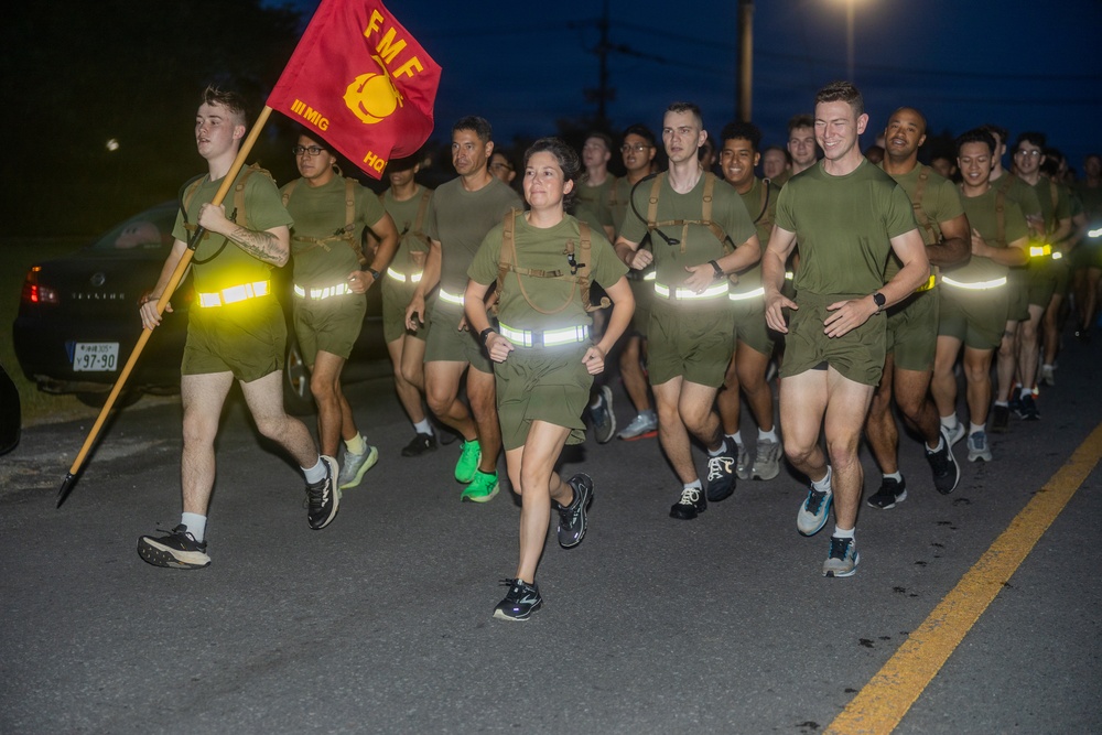 III Marine Expeditionary Force Information Group Marines participate in motivational run