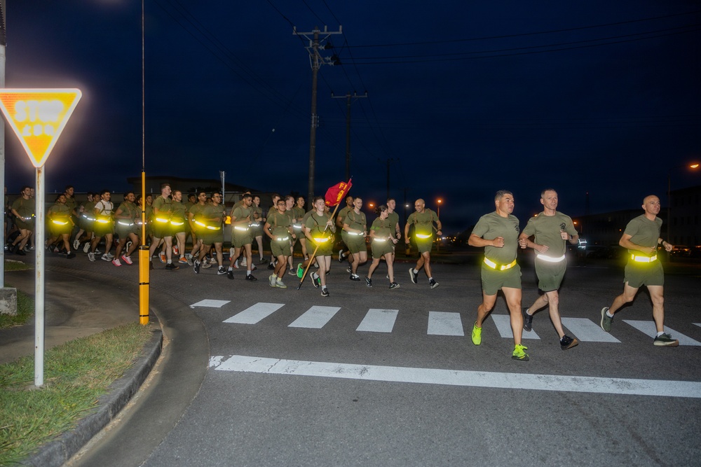 III Marine Expeditionary Force Information Group Marines participate in motivational run