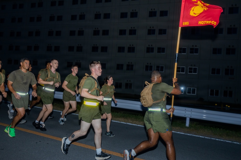 III Marine Expeditionary Force Information Group Marines participate in motivational run