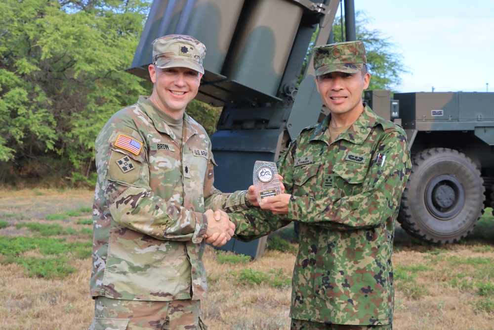 U.S. Army and Japanese commanding officers exchange memorabilia during RIMPAC 2026