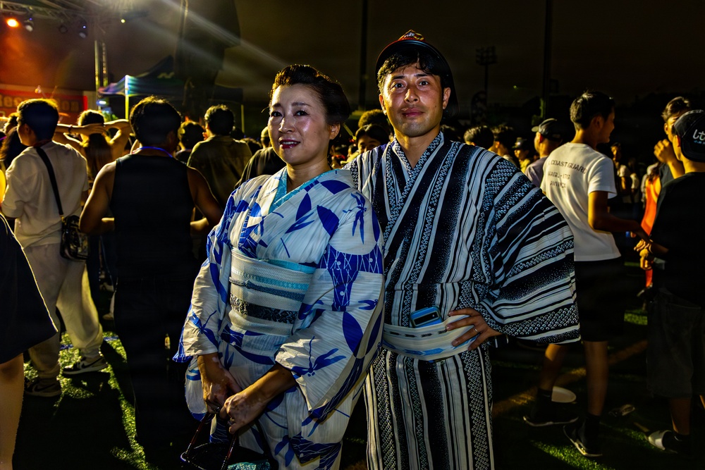 Sasebo community members pose for a photo during the Independence Day celebration