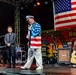 Capt. Michael Fontaine delivers closing remarks during Independence Day celebration