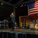 Sasebo City Mayor Daisuke Miyajima delivers closing remarks during the Independence Day celebration
