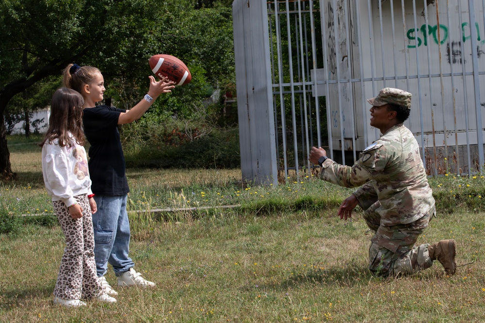 Future School students celebrate U.S. Independence Day with KFOR RC-E Soldiers