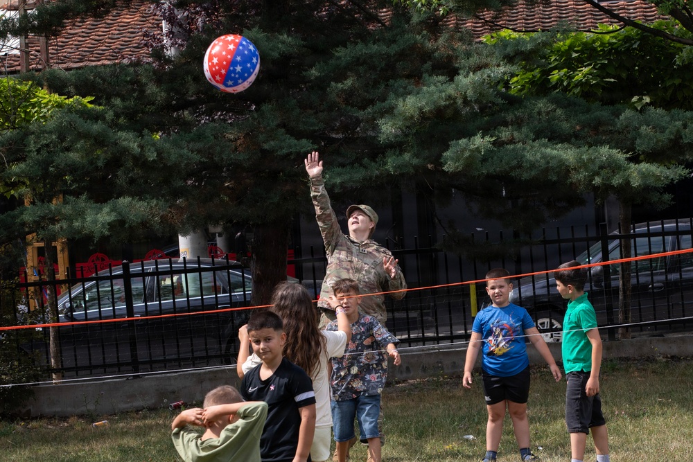 Future School students celebrate U.S. Independence Day with KFOR RC-E Soldiers