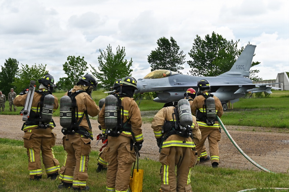 119th Wing Firefighters Approach Simulated F-16 Fire