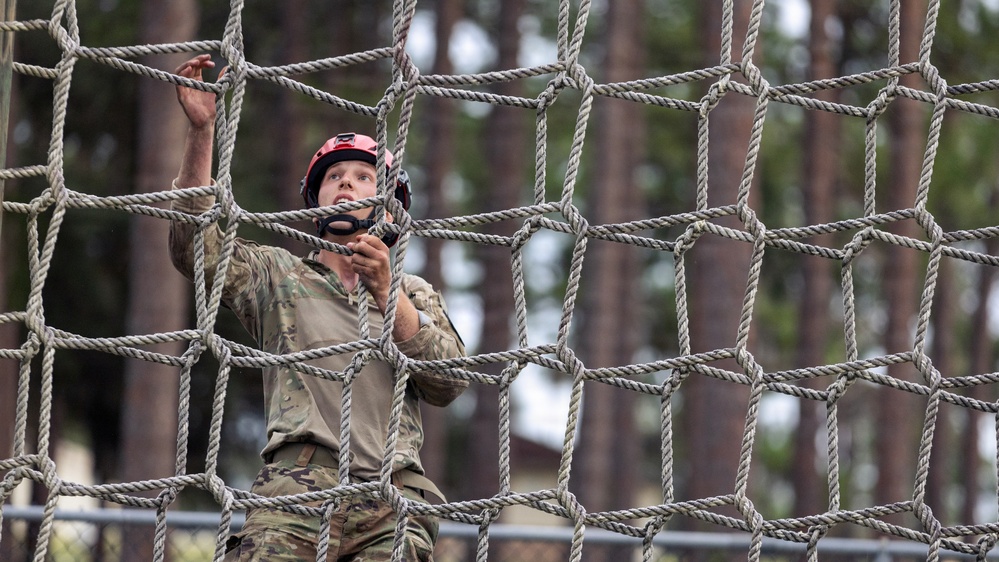 Utah Guardsman completes an obstacle course during Army National Guard 2026 Best Warrior Competition