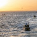 U.S. Coast Guard and Navy crews conduct helicopter training aboard Spirit of Norfolk