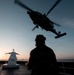 U.S. Coast Guard and Navy crews conduct helicopter training aboard Spirit of Norfolk