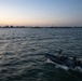 U.S. Coast Guard and Navy crews conduct helicopter training aboard Spirit of Norfolk