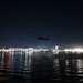 U.S. Coast Guard and Navy crews conduct helicopter training aboard Spirit of Norfolk