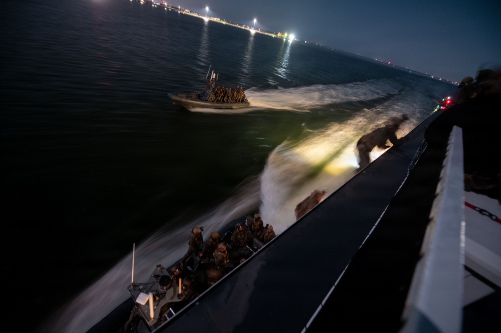 U.S. Coast Guard and Navy crews conduct helicopter training aboard Spirit of Norfolk