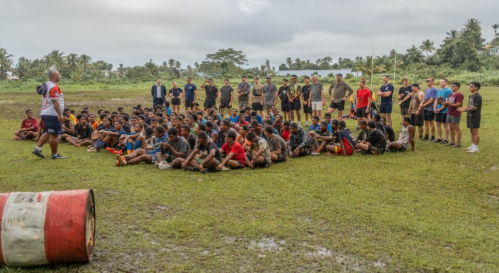USCGC Harriet Lane crewmembers meet with Fijian students during Operation Blue Pacific patrol