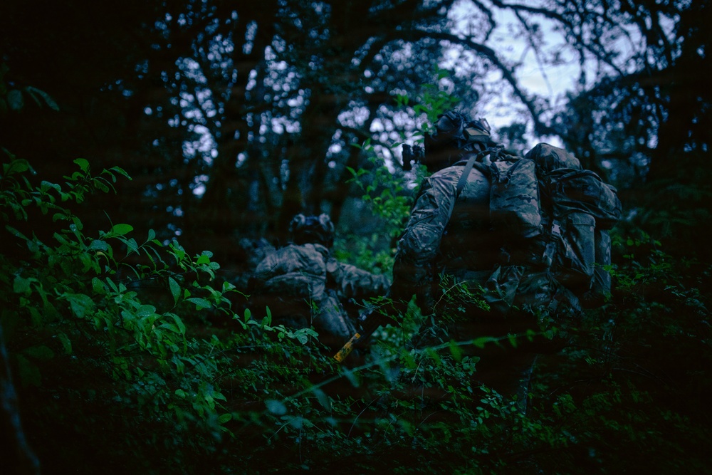 (A) 1st Special Forces Group (Airborne) conducts night infiltration training during Tahoma Strike