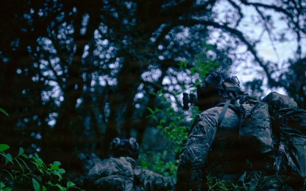 (A) 1st Special Forces Group (Airborne) conducts night infiltration training during Tahoma Strike