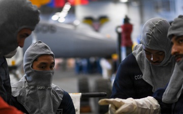 USS Carl Vinson (CVN 70) conducts general quarters drill