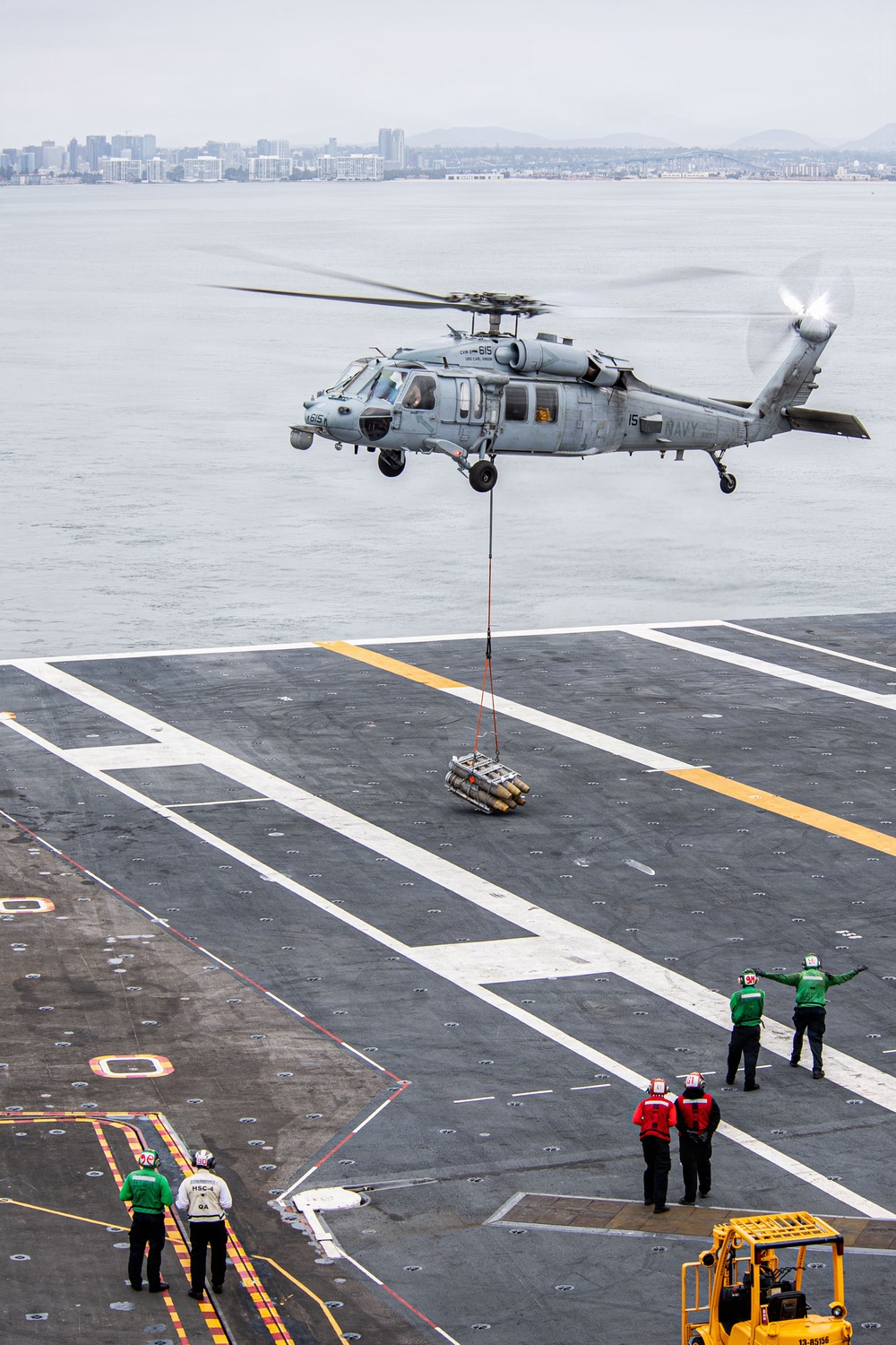 USS Carl Vinson (CVN 70) conducts ammunition onload