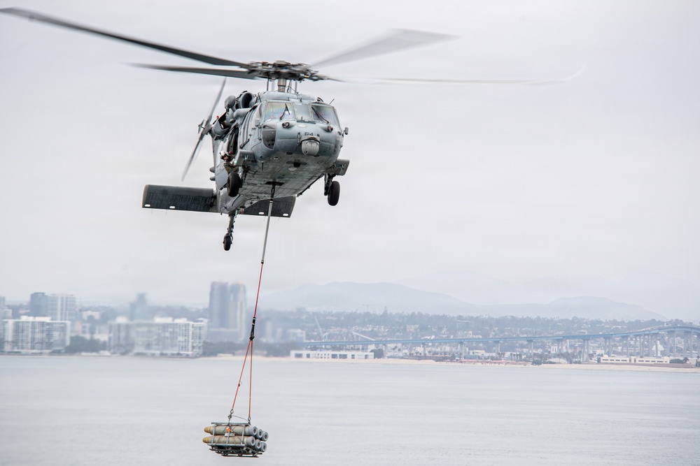 USS Carl Vinson (CVN 70) conducts ammunition onload