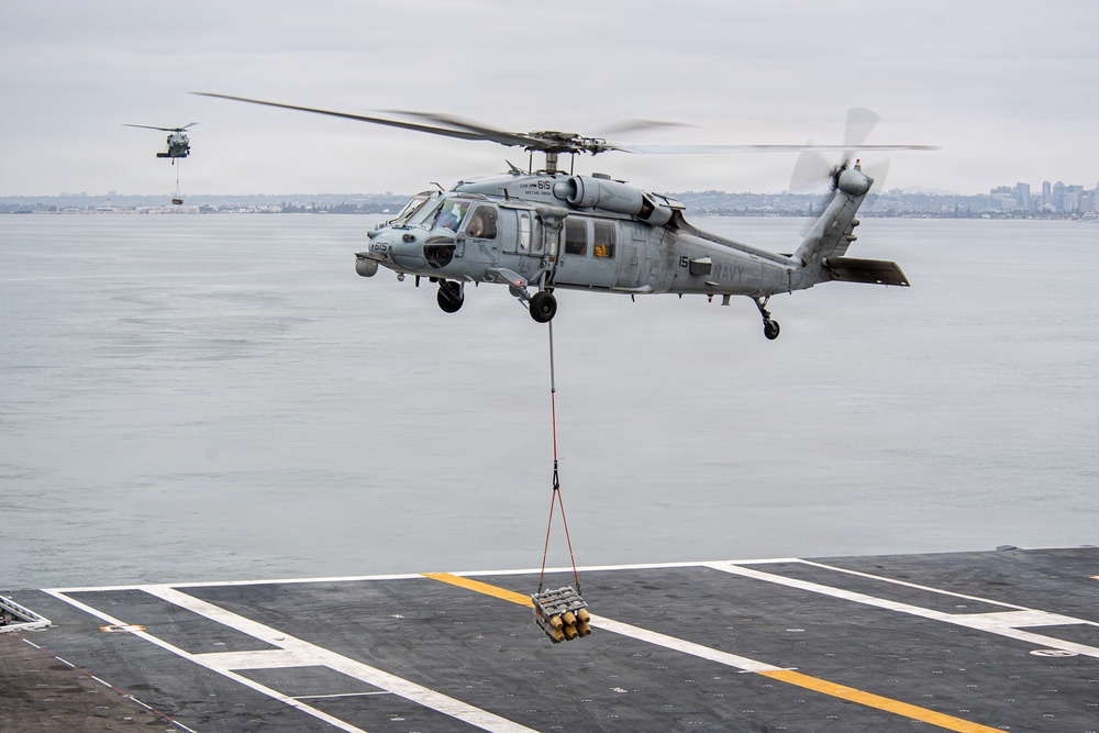 USS Carl Vinson (CVN 70) conducts ammunition onload