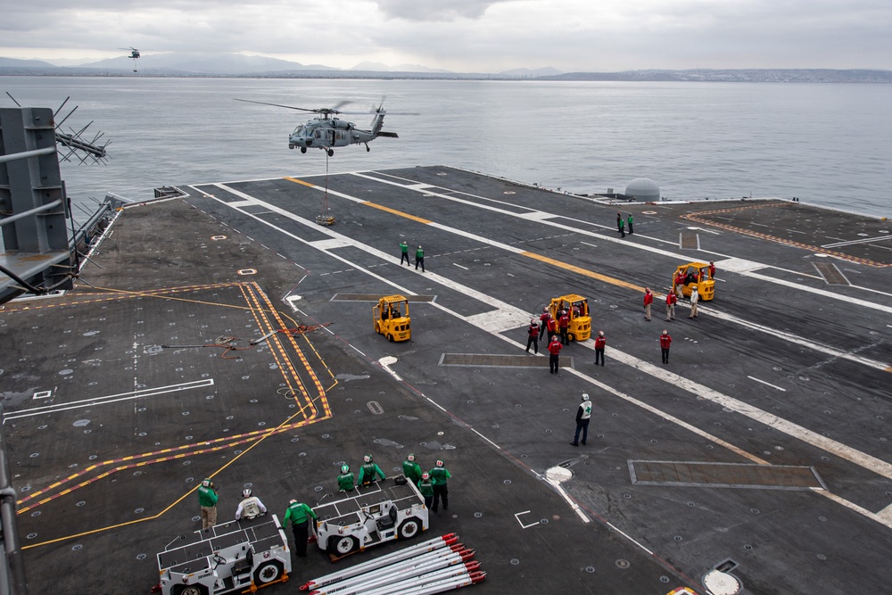 USS Carl Vinson (CVN 70) conducts ammunition onload