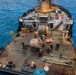 Partner nations participate in a buoy restoration project during RIMPAC 26