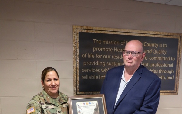 Fort McCoy Garrison commander presents Monroe County leaders with Garrison Certificates of Appreciation during Board of Supervisors meeting