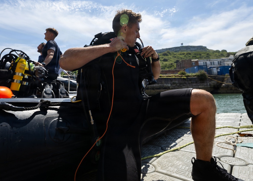 Royal Navy Clearance Diver Conducts Routine Casualty Drill at Sea Breeze 26