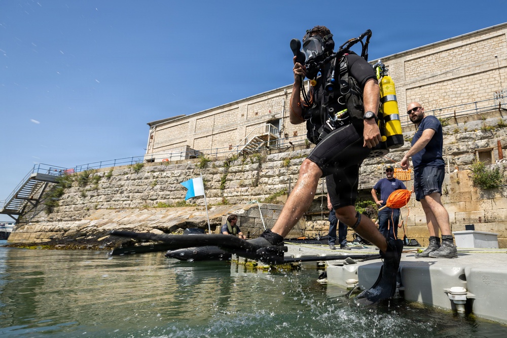 Royal Navy Clearance Diver Conducts Routine Casualty Drill at Sea Breeze 26