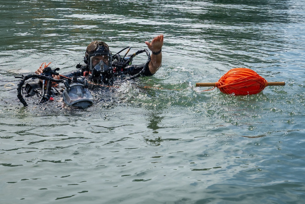 oyal Navy Clearance Diver Conducts Routine Casualty Drill at Sea Breeze 26