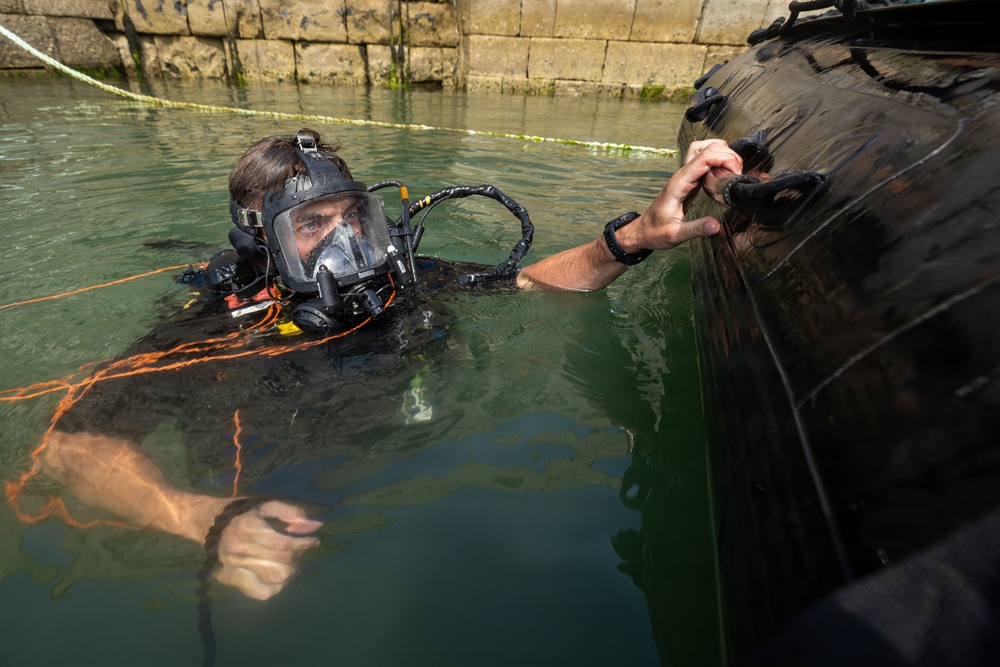 Royal Navy Clearance Diver Conducts Routine Casualty Drill at Sea Breeze 26