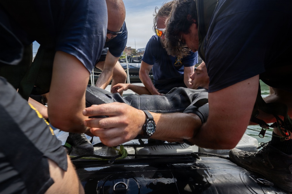 Royal Navy Clearance Diver Conducts Routine Casualty Drill at Sea Breeze 26