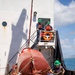 Partner nations participate in a buoy restoration project during RIMPAC 26