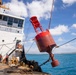 Partner nations participate in a buoy restoration project during RIMPAC 26