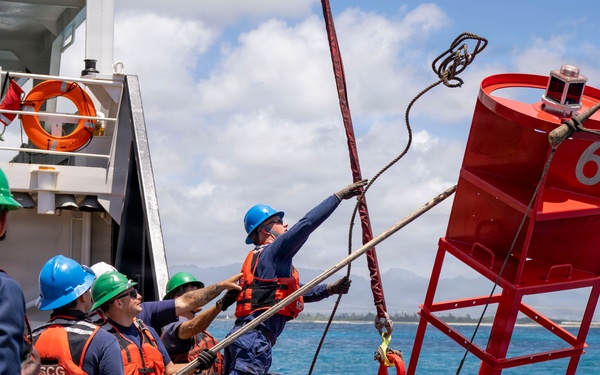 Partner nations participate in a buoy restoration project during RIMPAC 26