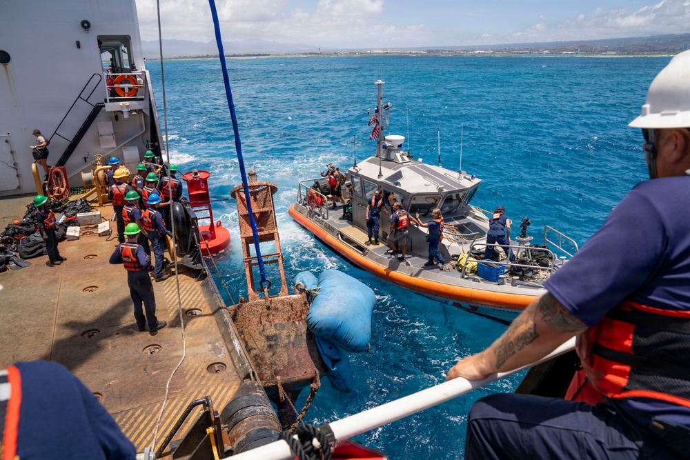 Partner nations participate in a buoy restoration project during RIMPAC 26