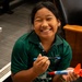 94th Army Air and Missile Defense Command Soldiers assist YIP student athletes with rocket building