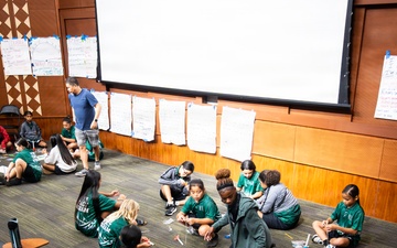94th Army Air and Missile Defense Command Soldiers assist YIP student athletes with rocket building