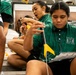 94th Army Air and Missile Defense Command Soldiers assist YIP student athletes with rocket building
