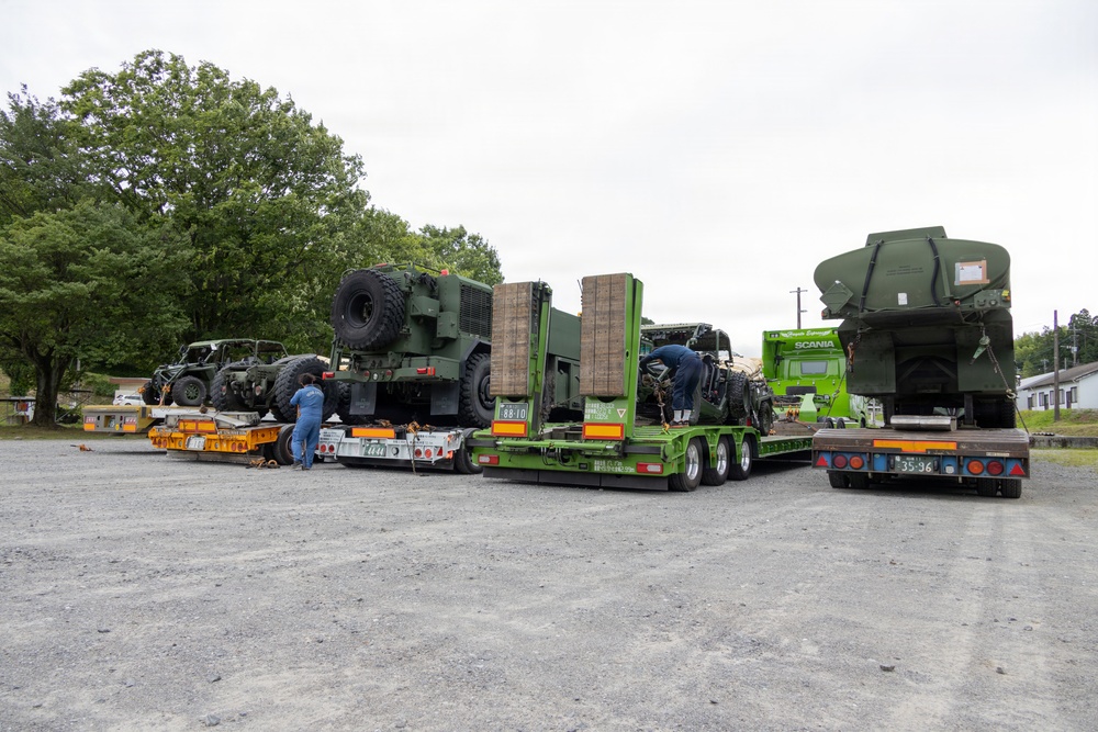 Marines with MWSS-171 unload tactical equipment