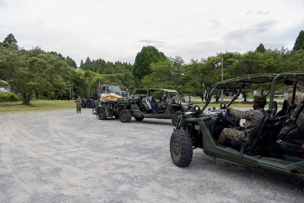 Marines with MWSS-171 unload tactical equipment