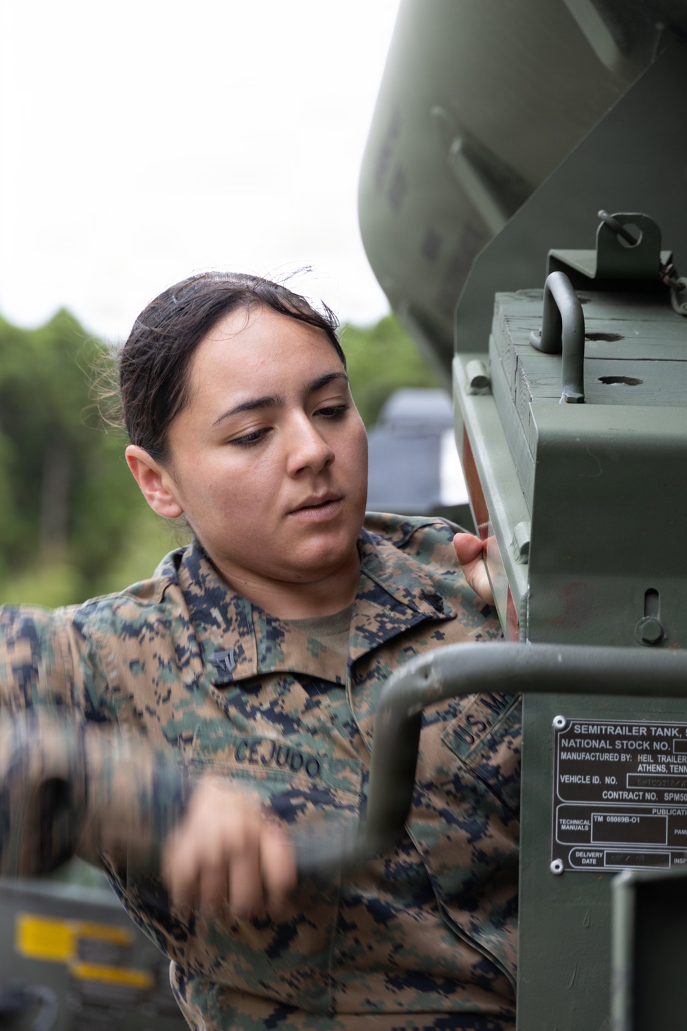 Marines with MWSS-171 unload tactical equipment