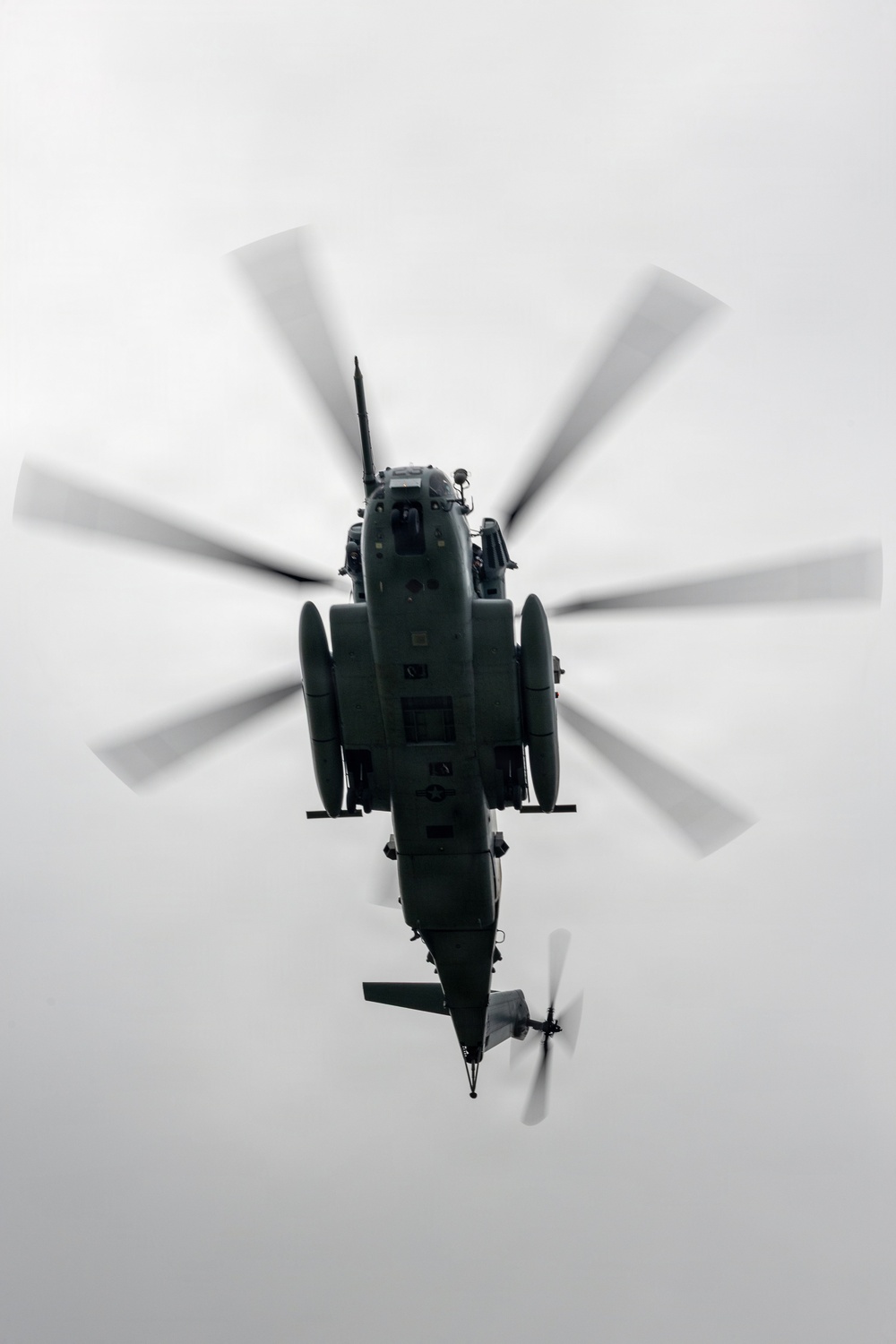 Helicopters land at a FARP site
